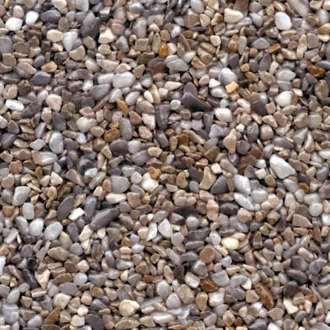 Steinteppiche 1 Nahaufnahme einer Bodenbeschichtung mit Steinteppich in Naturtönen.